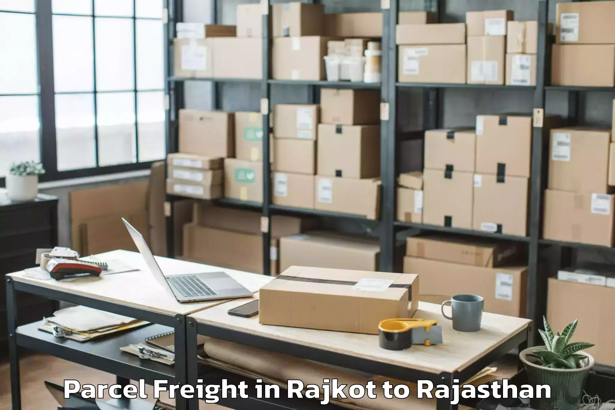 Leading Rajkot to Bari Dholpur Parcel Freight Provider